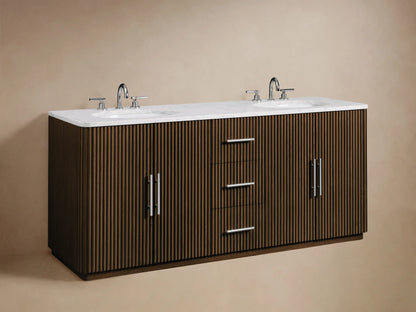 Finnley Double Vanity: Partially open dark reeded cabinet door with polished handle, revealing white folded towels and cosmetic bottles inside.