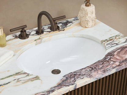 Finnley Double Vanity: dark wood, fluted front, veined marble top, two double doors, three central drawers, bronze pulls.