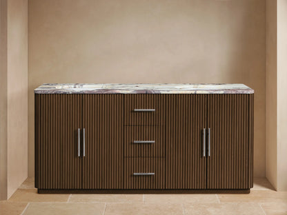 Finnley Double Vanity: Dark oak, reeded texture, marbled top, silver hardware. Left door open, revealing white towels.