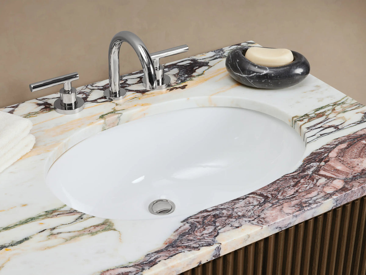 Finnley Double Vanity: Dark brown fluted wood cabinet, white and purple swirl marble top, silver bar pulls.