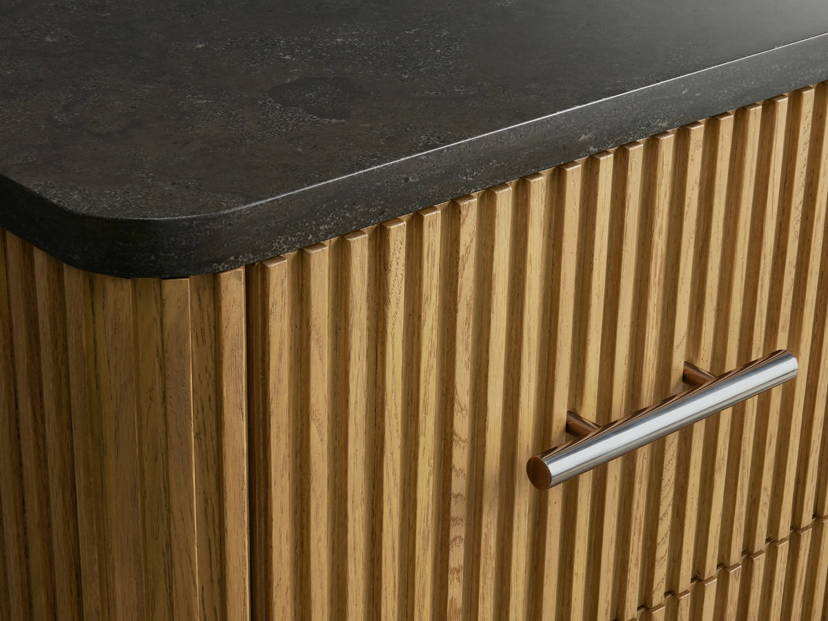Finnley Short Etagere drawer with oak wood texture, open to reveal a neatly folded stack of cream towels.