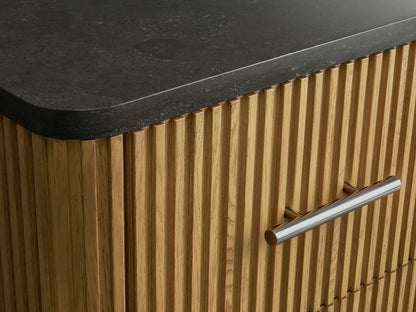 Finnley Short Etagere drawer with oak wood texture, open to reveal a neatly folded stack of cream towels.