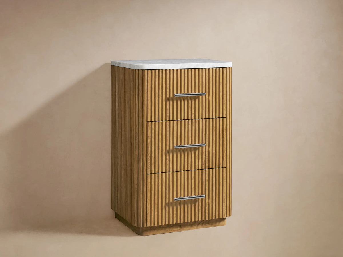 Finnley Short Etagere with vertical oak wood slats and a rounded Carrara marble top, featuring a polished nickel handle.