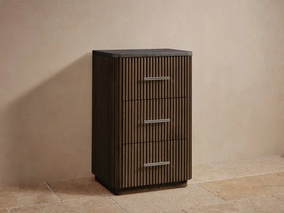Open drawer of Finnley Short Bath Cabinet with slatted oak wood design, holding white towels and showing a polished nickel handle.