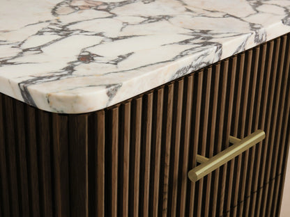 Finnley Short Bath Cabinet: Dark brown fluted wood, white marble top with grey veining, 3 brass handles.