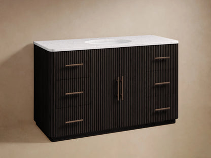 Finnley Wide Single Vanity in dark fluted wood, white marble top, oval sink, bronze faucet, 6 drawers, 2 central doors.