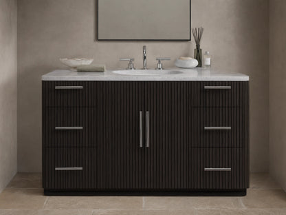 The image shows the Finnley Single Wide Vanity with a dark oak finish. It has a white stone top and an oval ceramic sink, with silver hardware on six drawers and two central doors.