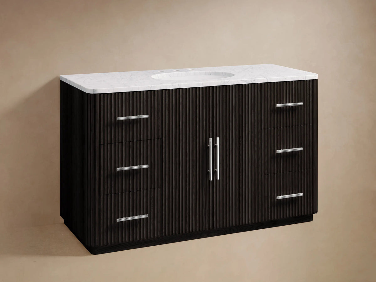 Finnley Single Wide Vanity with dark wood finish, marble top, integrated sink, metal handles, and ribbed texture front.
