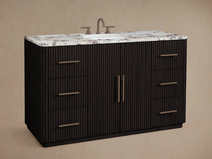 Finnley Wide Single Vanity close-up: white oval sink, antique bronze faucet, Calacatta Viola marble top with dark veining.