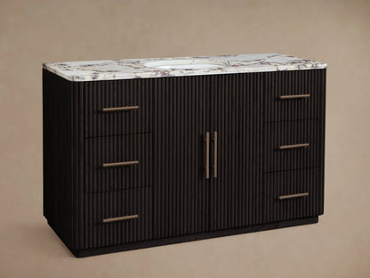 Finnley Wide Single Vanity: Dark fluted wood with white veined marble top, oval sink, bronze faucet, 6 drawers & 2 doors.