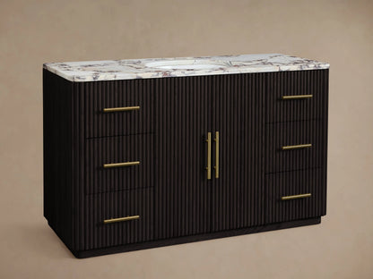 Finnley Wide Single Vanity with dark fluted wood, white marble top, gold widespread faucet & hardware, oval sink, 6 drawers, 2 doors.