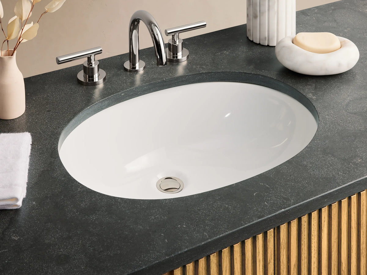 Finnley Single Wide Vanity with vertical oak slats, black stone top, and polished nickel hardware. Features six drawers and central doors.