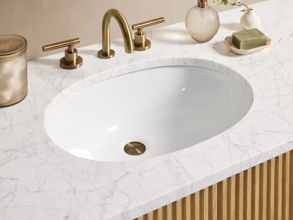 Finnley Single Wide Vanity with ribbed oak wood design, six drawers, central double doors, stone top, and brass hardware.
