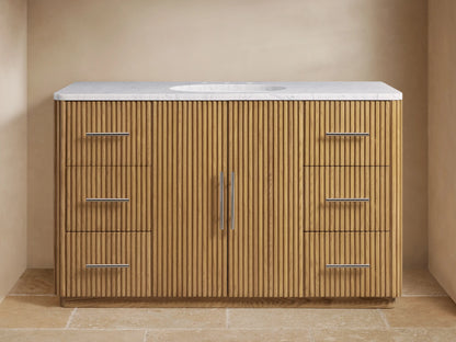 Finnley Single Wide Vanity with oak wood slatted front, polished nickel hardware, Carrara marble top, and oval ceramic sink.