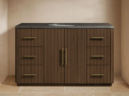 Finnley Wide Single Vanity: dark brown fluted wood, bluestone top, oval sink, brass faucet, 6 side drawers, 2 center doors.
