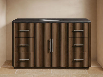 Finnley Wide Single Vanity, dark fluted wood, dark gray stone top, oval sink, chrome faucet, polished nickel handles.