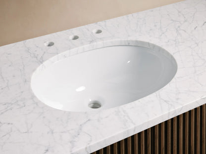 Finnley Wide Single Vanity with oval white sink, white marble countertop, antique bronze faucet, and dark ribbed wood base.