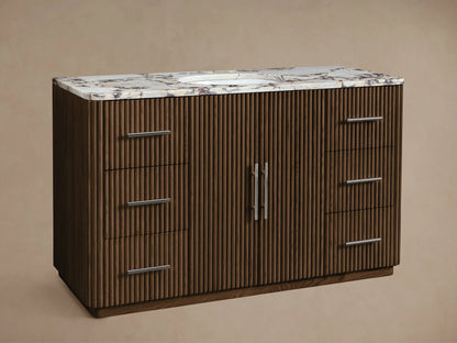 Brown ribbed wood Finnley Single Vanity with white marble top, oval sink, silver faucet, two center doors, and 6 silver-handled drawers.
