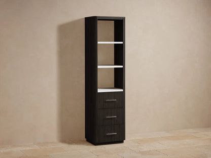 Close-up of Finnley Tall Bath Cabinet's two white Carrara marble shelves within a dark oak wood frame with vertical fluting.
