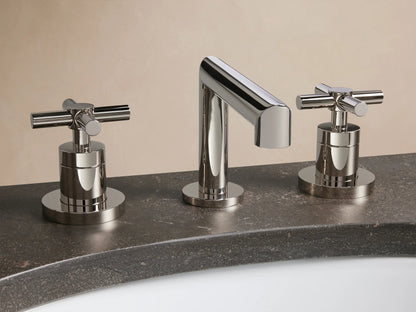 Lomas Faucet with a polished nickel finish on a marble countertop, featuring two cross-styled handles and a matching pop-up drain.