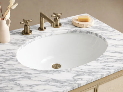 Malone Double Vanity with white marble top, bone wood frame, cream shagreen texture doors, drawers, and brass hardware, front view.