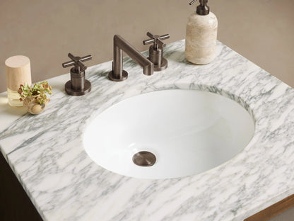 Malone Powder Vanity: Dark wood vanity with grey shagreen-textured doors, white marble top, integrated sink, and dark pull handles.