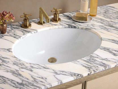 Malone Wide Single Vanity. Light oak vanity with veined marble top, single sink, 2 textured beige doors, 6 textured beige drawers.