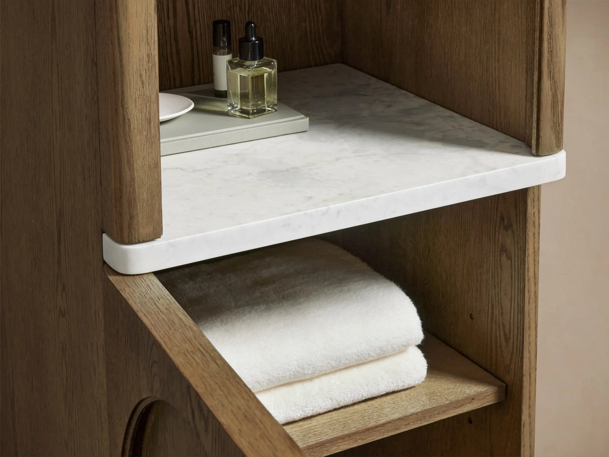 Oak wood Provo Etagere with four shelves and a white marble stone top. Features a soft-close door and a natural finish.