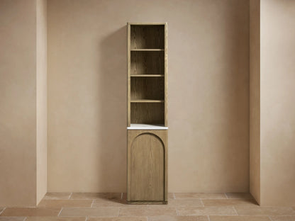 Provo Etagere crafted from oak wood with visible grain pattern. Features adjustable shelves, one holding folded white towels.