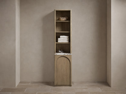 Tall, narrow Provo Etagere with oak wood frame, featuring shelves with towels and items. Marble stone top and closed cabinet below.