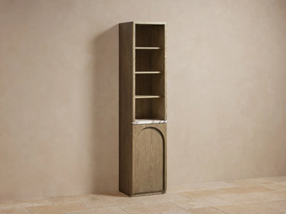Tall, narrow Provo Etagere with oak wood frame, featuring shelves with towels and items. Marble stone top and closed cabinet below.