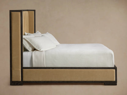 Close-up of Darien Channel-Stitched Shelter Bed headboard. Dark oak frame, vertical tan channel-stitched panels.