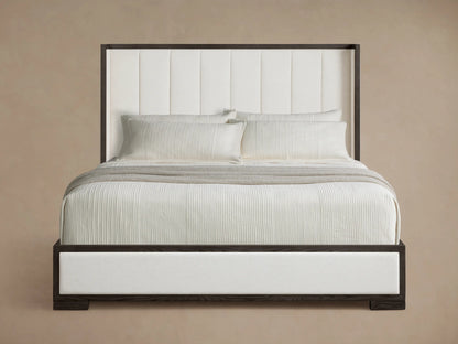 Darien Channel-Stitched Shelter Bed: dark oak frame, white channel-stitched upholstered headboard & side rails, white bedding.