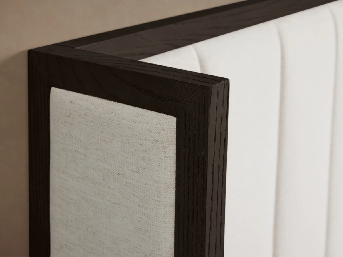 Darien Channel-Stitched Shelter Bed with dark oak frame, white channel-stitched headboard, footboard, and white bedding.