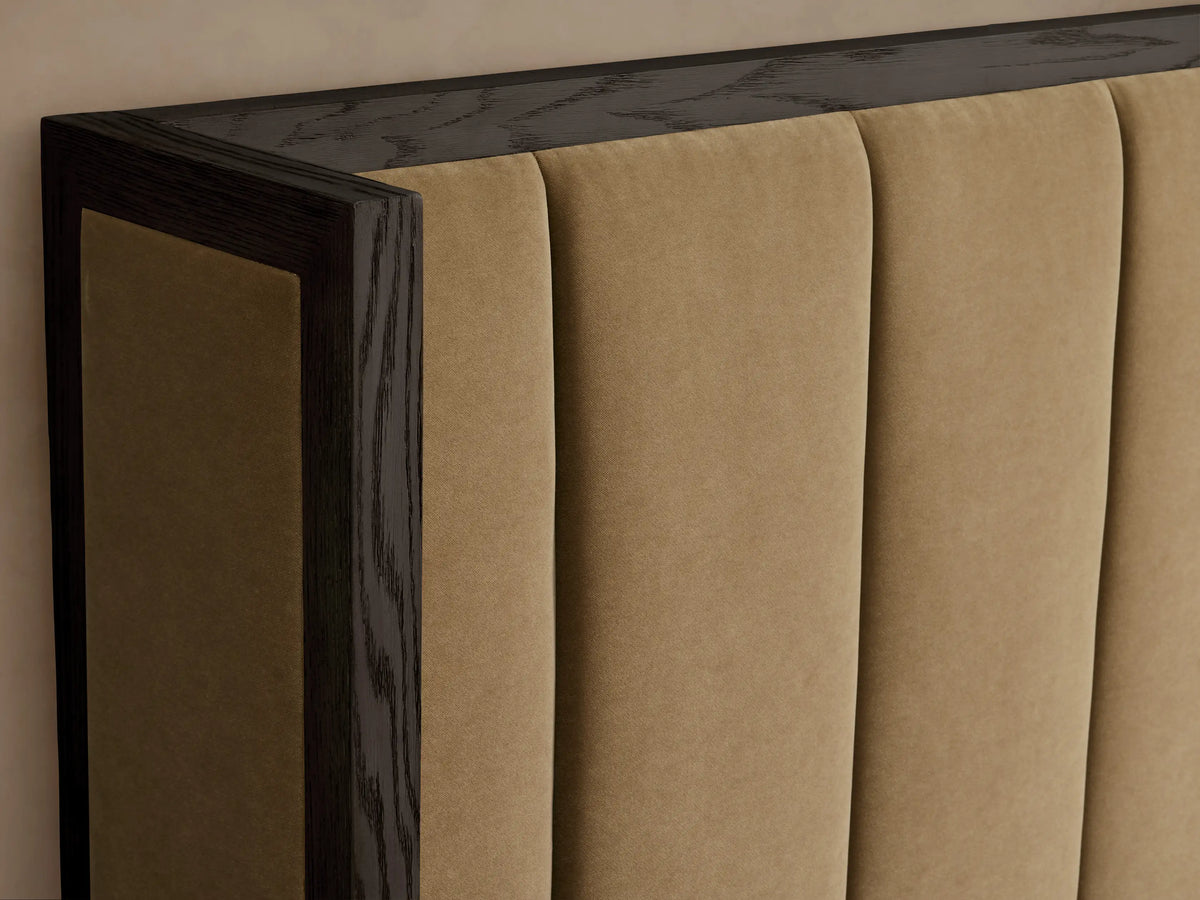 Darien Channel-Stitched Shelter Bed featuring a dark wood frame, tan channel-stitched headboard and footboard, with white bedding.