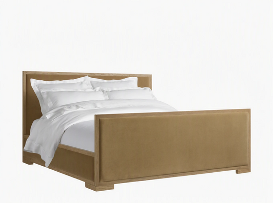 Darien Panel Bed with High Footboard in oak wood and veneer, upholstered panels, white bedding, in a neutral room.