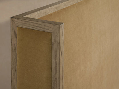 Close-up of the Darien Shelter Bed's corner, featuring oak veneer frame with hand-applied finish and upholstered panel in beige.