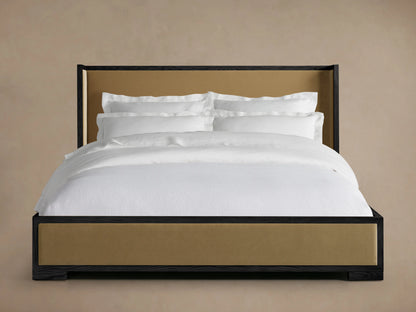 Darien Shelter Bed with low footboard, featuring oak veneer and solid wood frame, upholstered panels, and white bedding.
