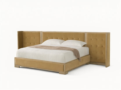 Darien extended shelter bed with light oak frame, camel box-tufted upholstery, white bedding, on a wood floor.