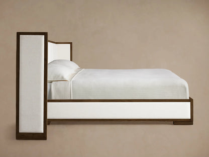 Front view of the white upholstered Darien Extended Channel-Stitched Shelter Bed with dark wood frame and extended shelter-style headboard.