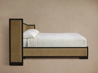 Close-up of Darien Extended Channel-Stitched Shelter Bed with dark wood frame and beige channel-stitched upholstery at a corner.