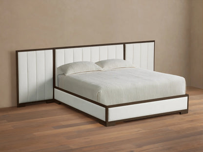 Front view of the Darien Extended Channel-Stitched Panel Bed, featuring a brown wooden frame and white channel-stitched upholstered panels, with white bedding.