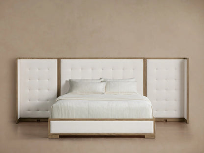 Darien Extended Box-Tufted Shelter Bed with white tufted headboard, flanking shelter panels, light oak frame, and white bedding.