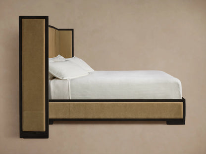 Close-up of Darien Extended Shelter Bed corner. Dark wood frame borders beige channel-stitched upholstered panels.