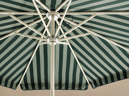 Front view of an open dark green and off-white striped Patio Umbrella with a white pole and round base.