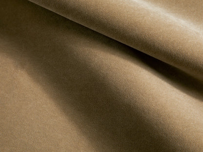 Close-up of the beige velvet fabric on the Deacon Ottoman.