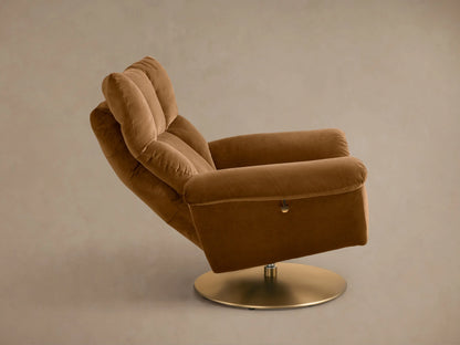 Close-up of the caramel Deacon Swivel Recliner, showing its plush, channel-tufted backrest and a soft armrest.