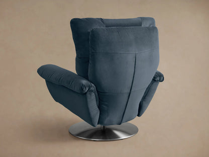 Close-up of the plush blue Deacon Swivel Recliner showing its segmented backrest and upholstered arm.