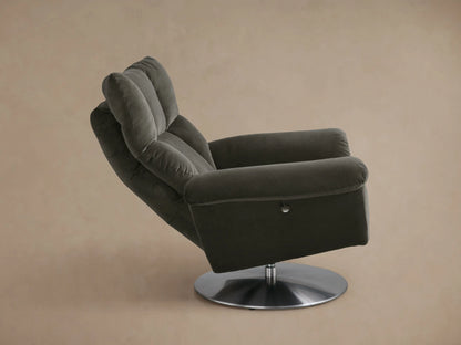 Rear-side view of the dark gray Deacon Swivel Recliner, featuring a plush, paneled back and a round metallic swivel base.