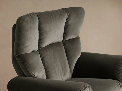 Front view of the dark grey Deacon Swivel Recliner with plush, padded upholstery and a silver round swivel base.